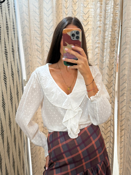 Blusa topitos dorados