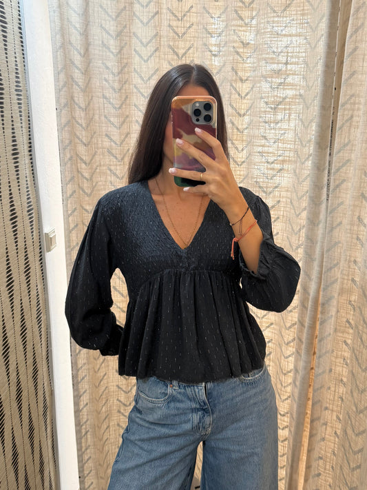 Blusa brillo gris